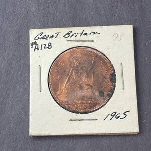 1965 Great Britain One Penny 
It does have wear some coloration see photos